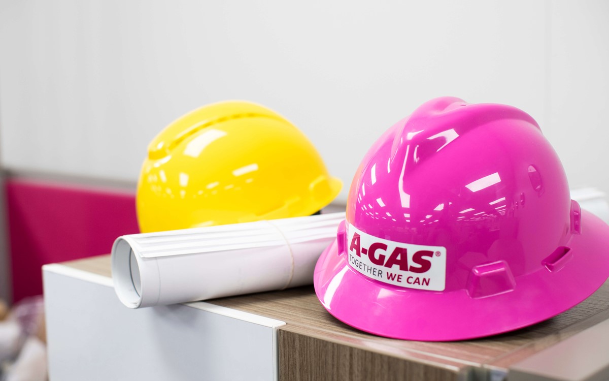 A-Gas branded hardhats in a cowboy hat style