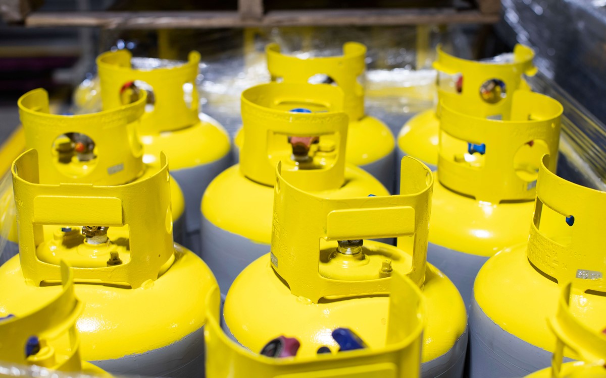 A close up of yellow and grey recovery palettes in a cylinder