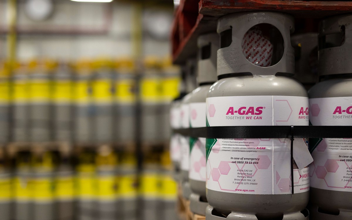 close up of industrial cylinders with more in background