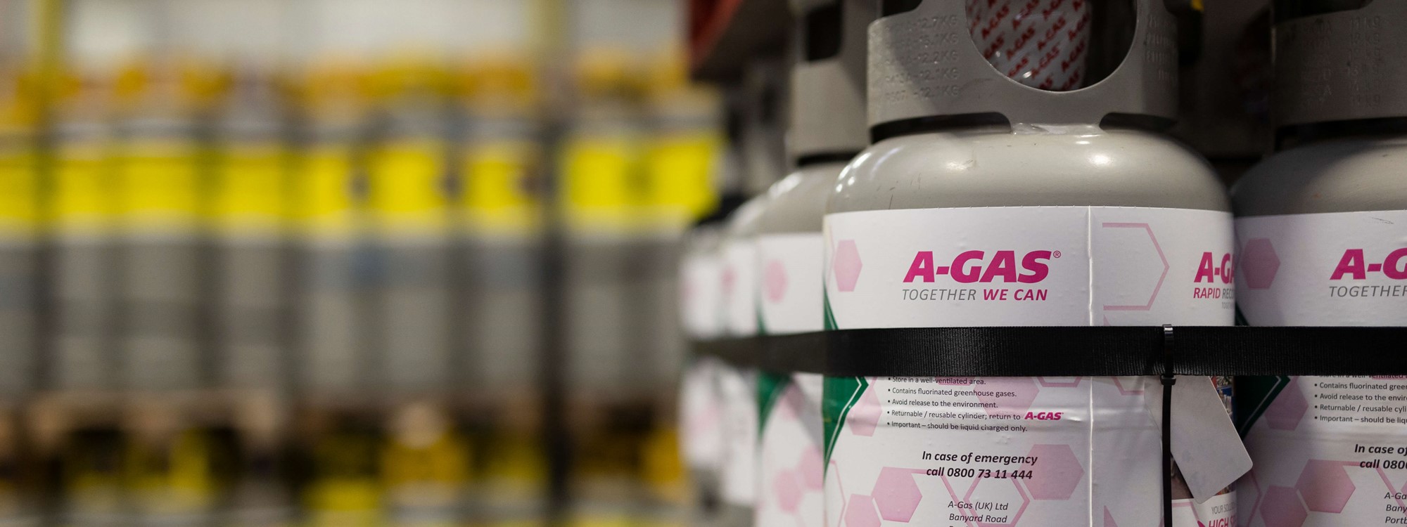 close up of industrial cylinders with more in background