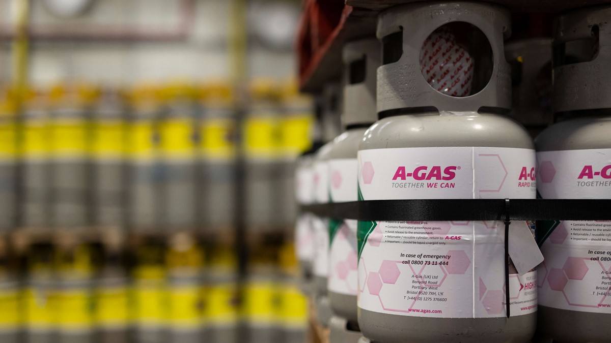 close up of industrial cylinders with more in background