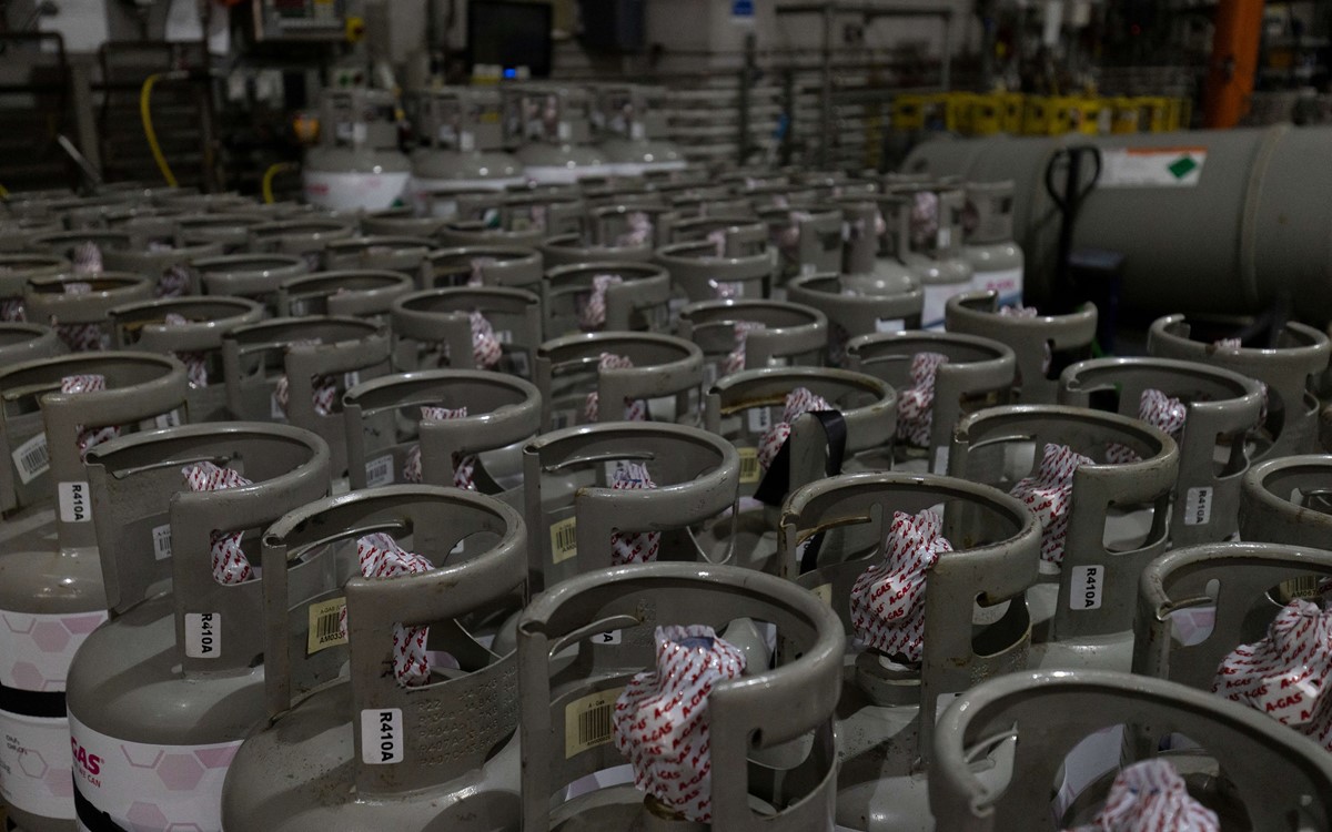 a warehouse floor of industrial gas cylinders