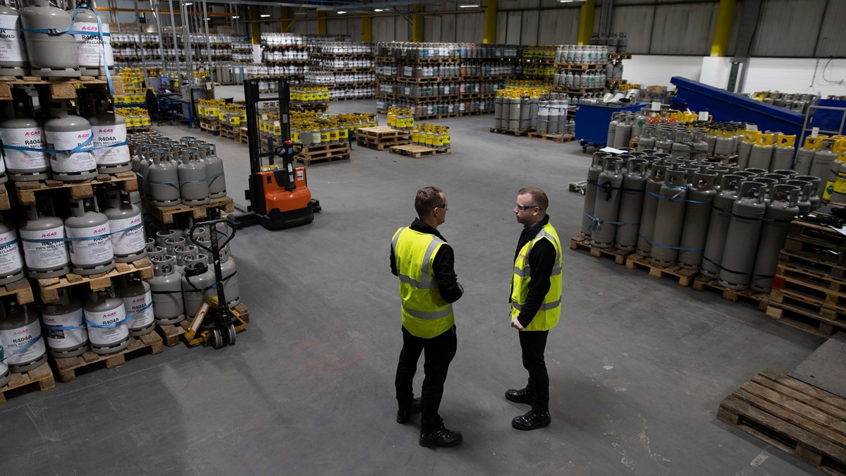 operatives in an industrial cylinder warehouse