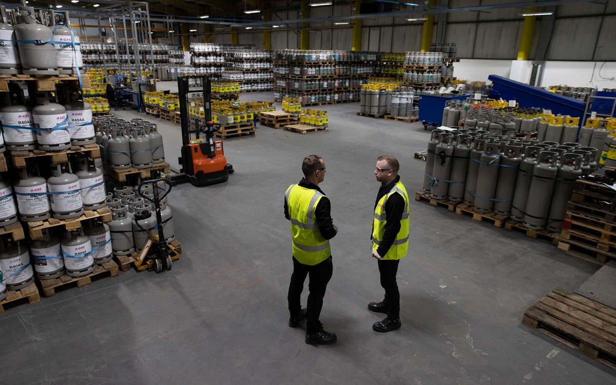 operatives in an industrial cylinder warehouse