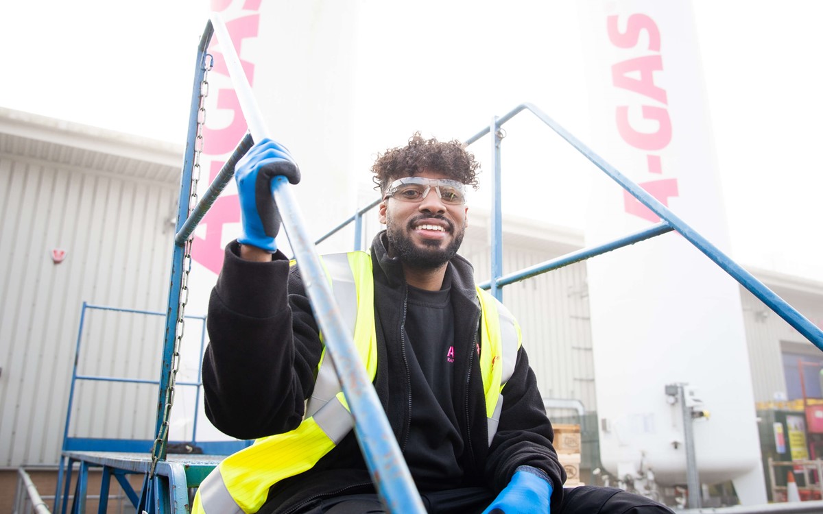 service engineer sitting on steps