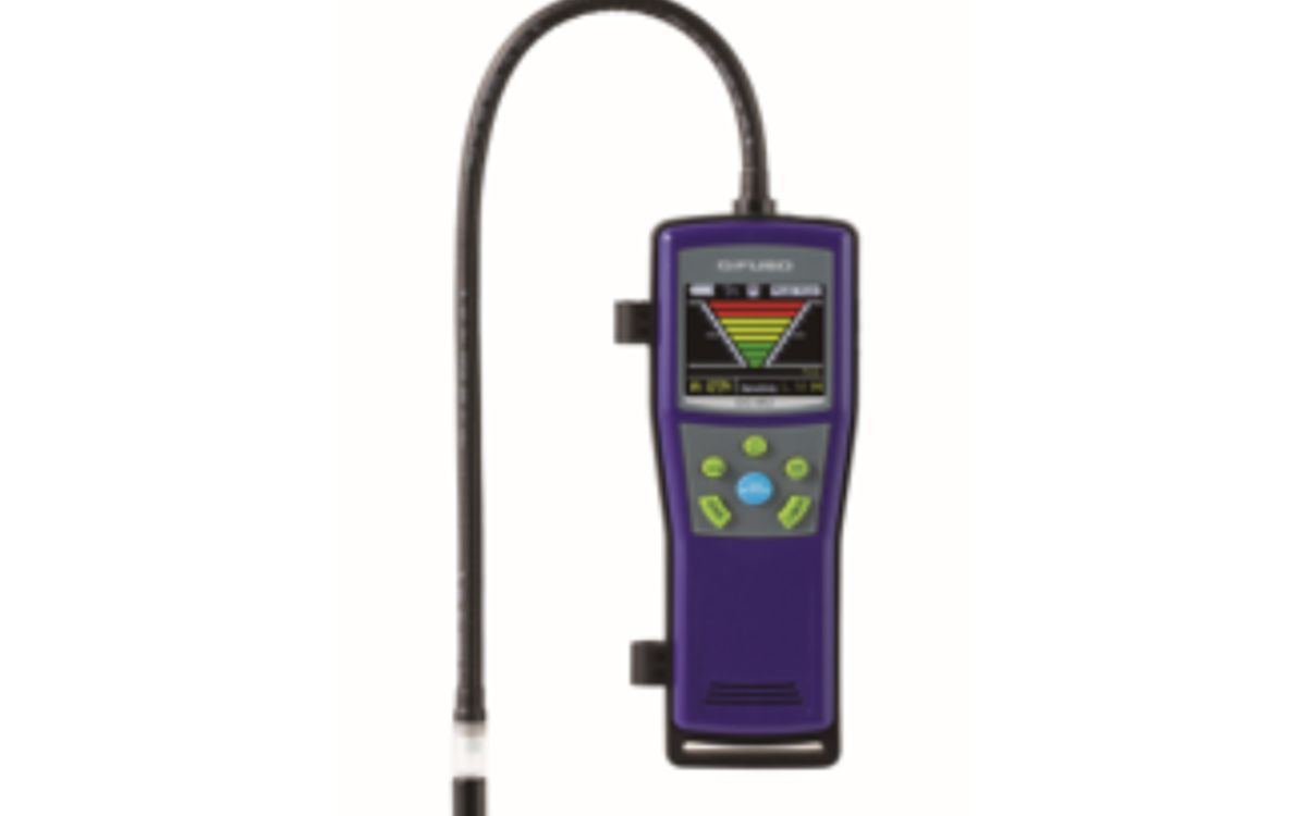 A purple piece of technology with a grey wire on a white background 