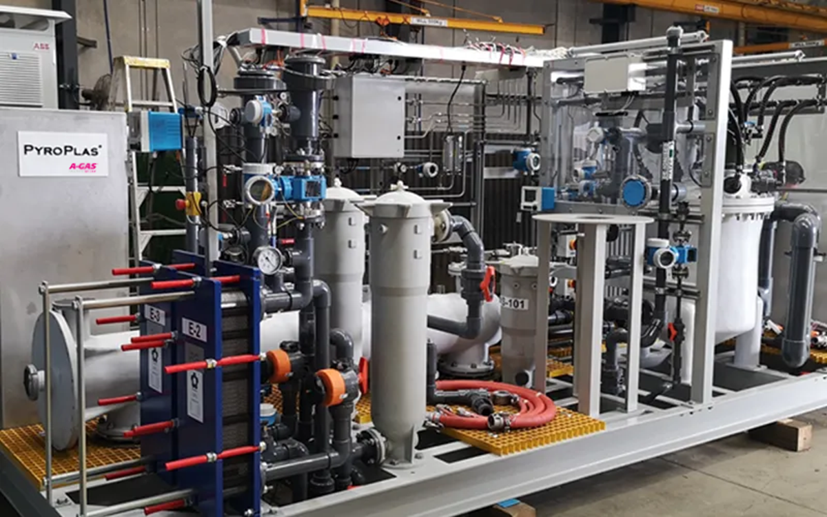 An image of a Pyroplas destruction unit, there is a small sign on the destruction unit with PyroPlas and the A-Gas logo on it