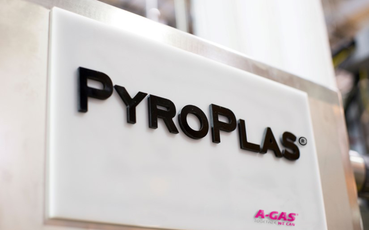 An image of a white sign with PyroPlas and the A-Gas logo on it