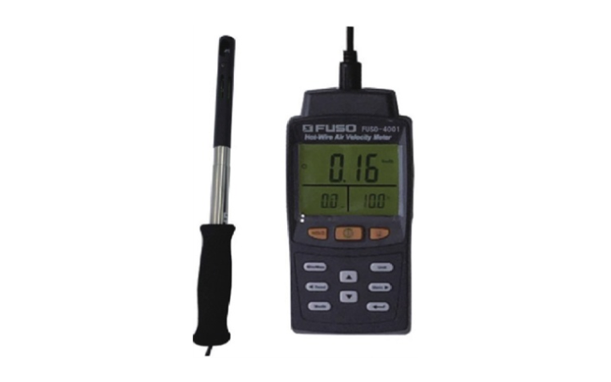 A black piece of technology and black wire on a white background 